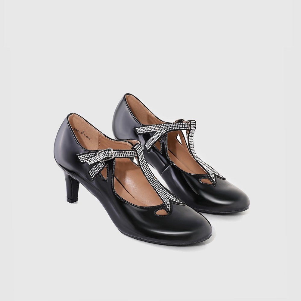Closed toed T strap black w/rhinestone pump. Babeyond size 8.5.